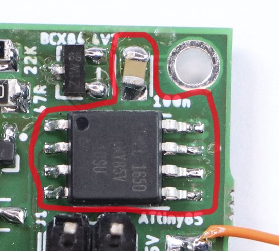 Excerpt from the photograph of the circuit board. The microcontroller and its capacitor are highlighted.
