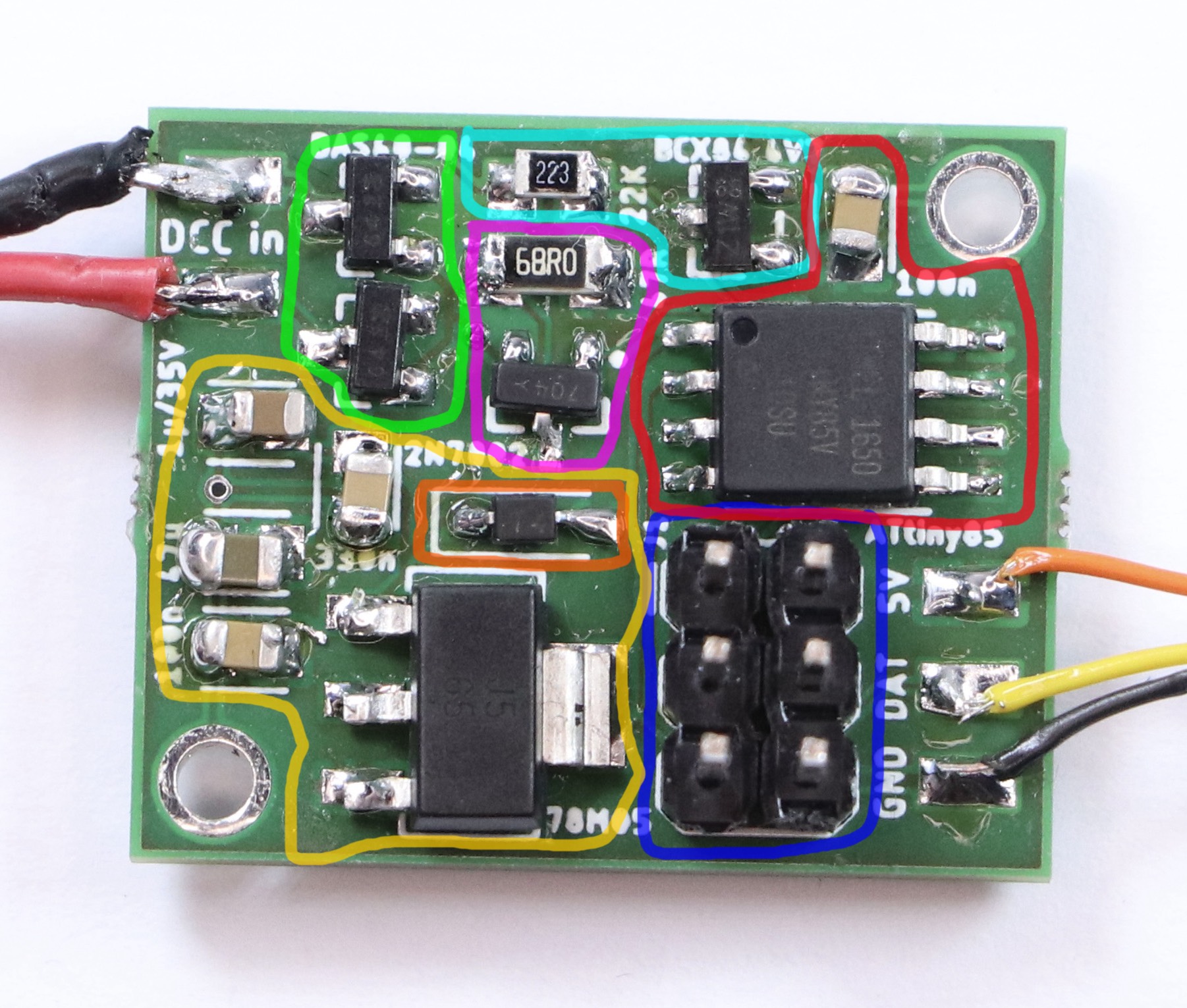 The photograph of the circuit board again. All parts are highlighted in different colors.