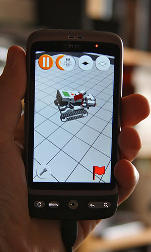 An HTC Desire phone, with the simulator running on it.